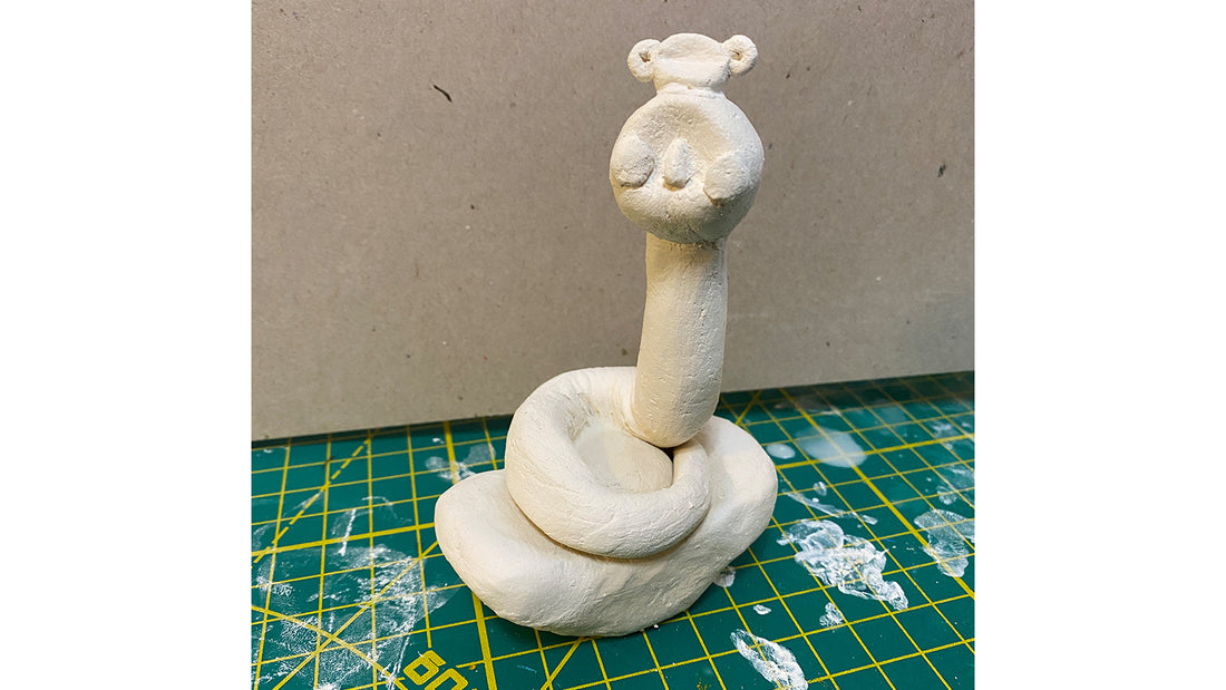 This Snake Sits on Fortune — Wishing You a Prosperous Year of the Snake!
